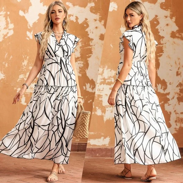 Midi dresses with wrap - around skirts for a customizable fitElsie - Midi Dress