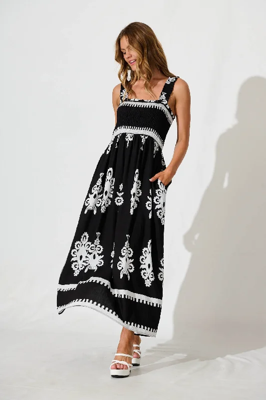 Maxi dresses with an empire waist for a flattering fit on all body typesEvanston Maxi Dress In Black With White Print