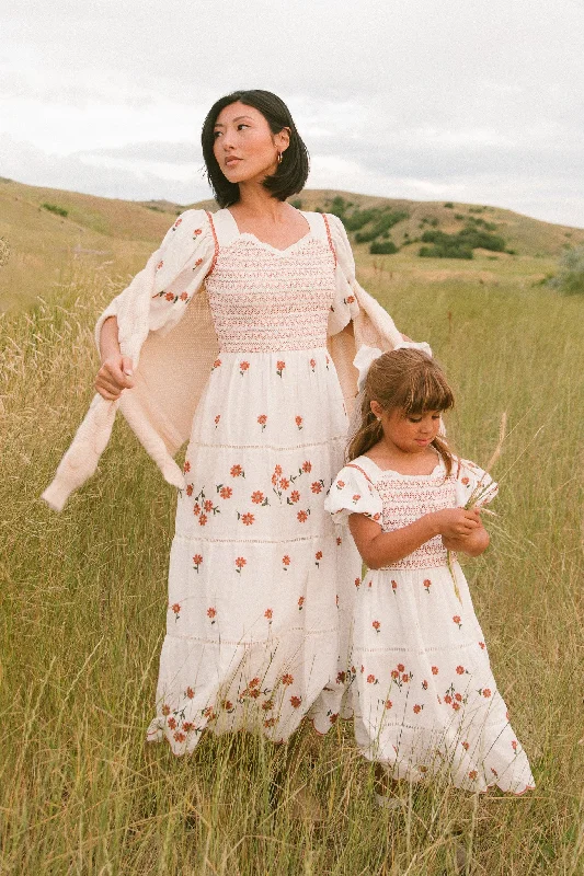 Ruffled maxi dresses with a tiered skirt for added volumeGreta Midi Dress in Rust Floral